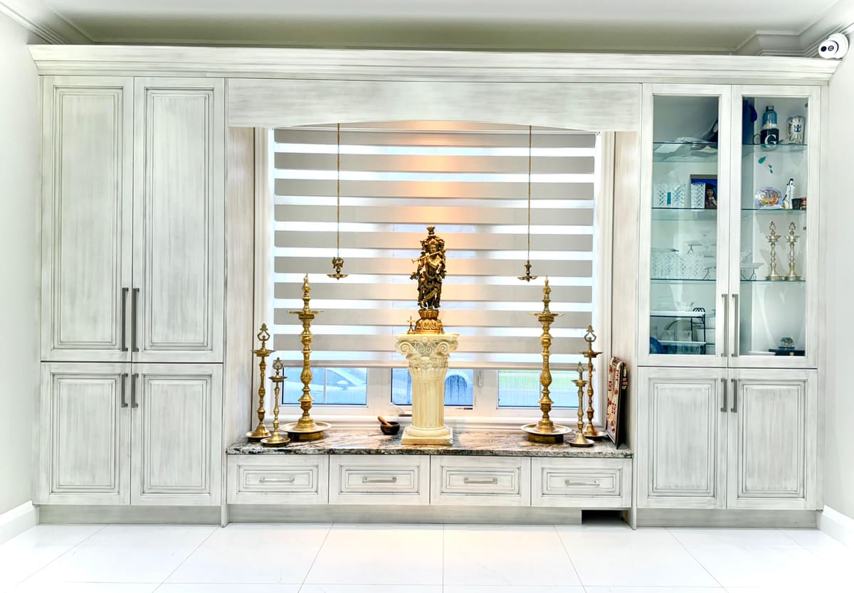 Custom pooja mandir unit with glass display cabinets